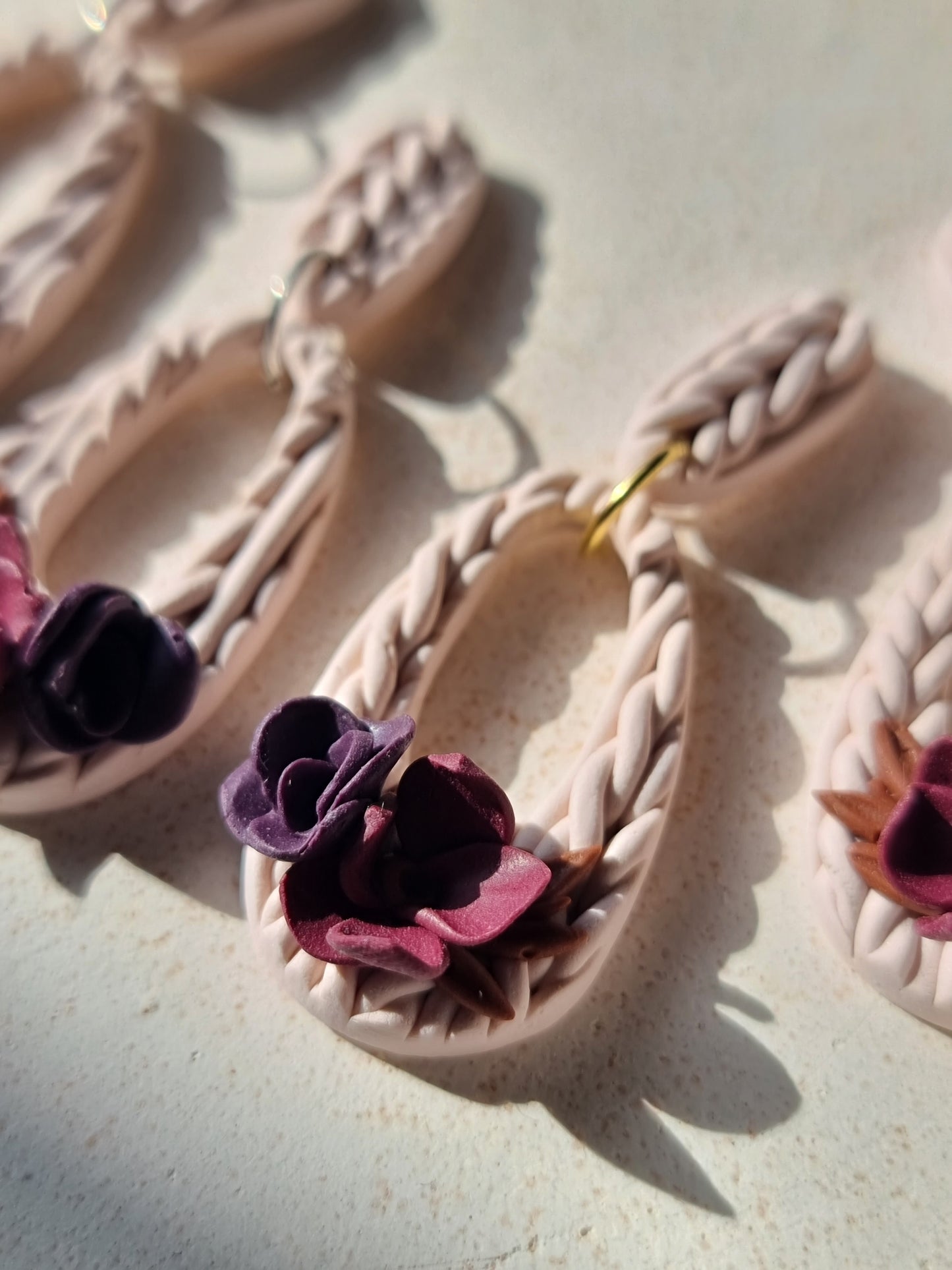 Floral knitted dangles