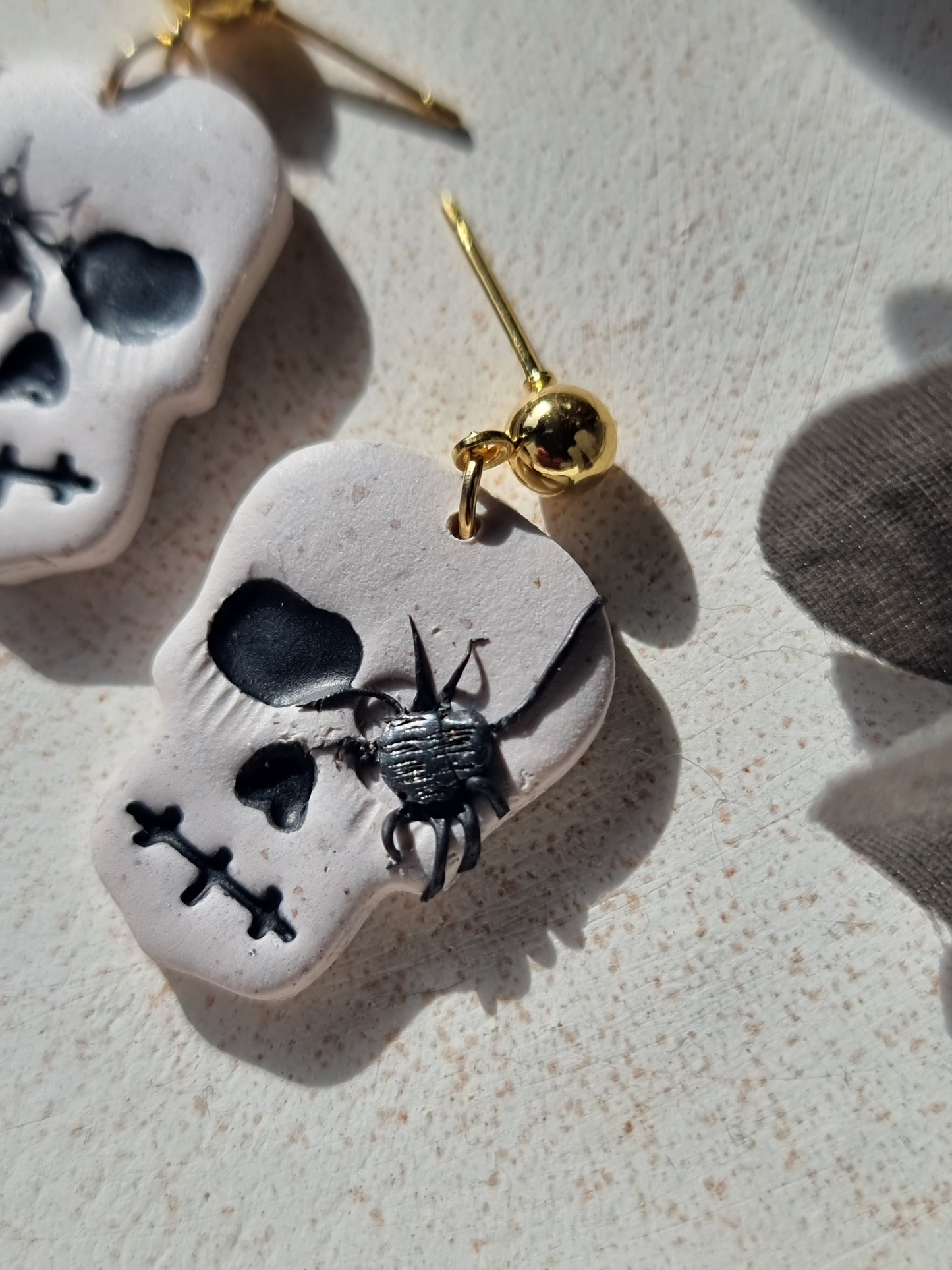 Spider skulls| can be switched for a fish hook or silver