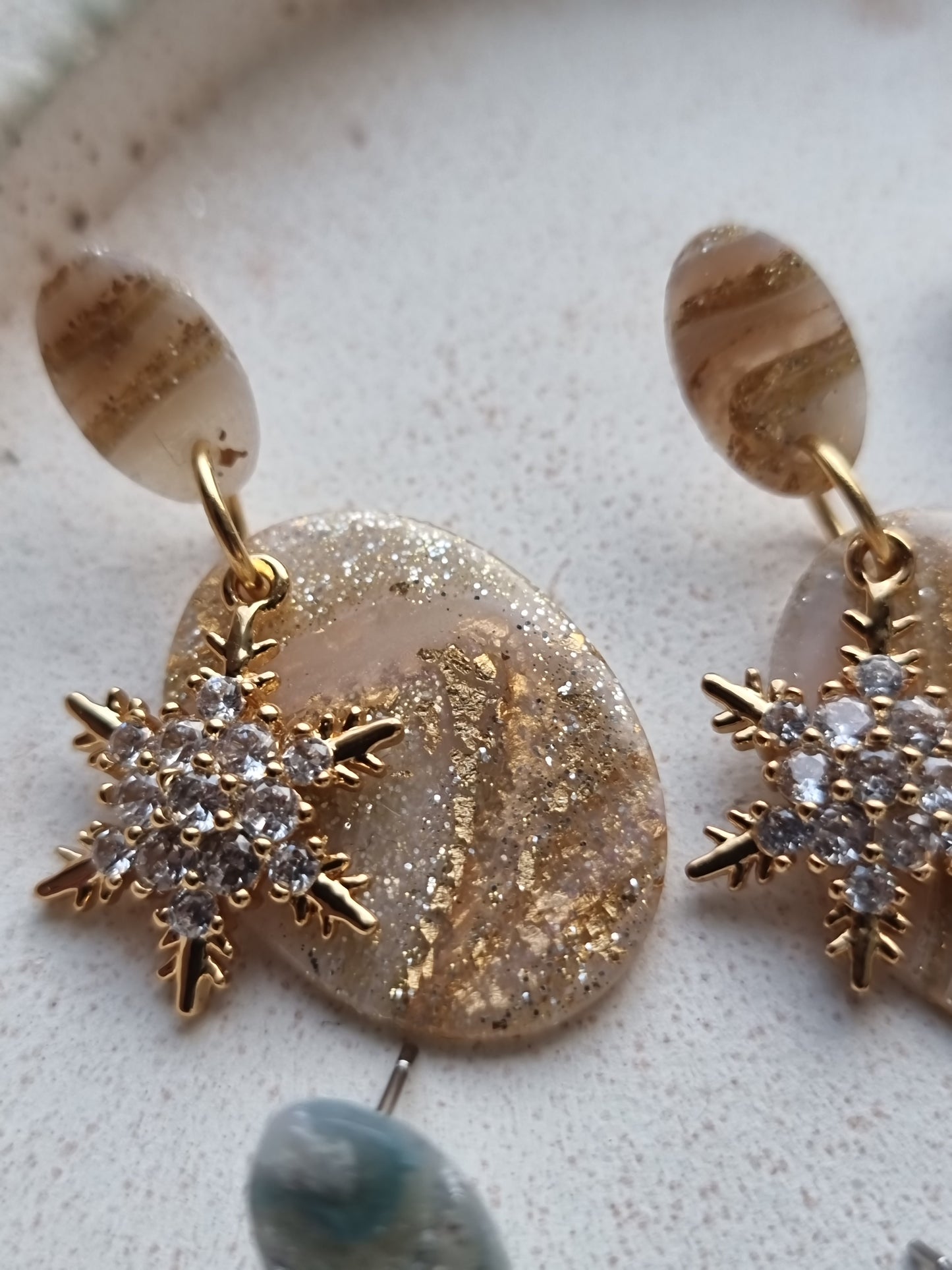Snowflake dangles white and gold