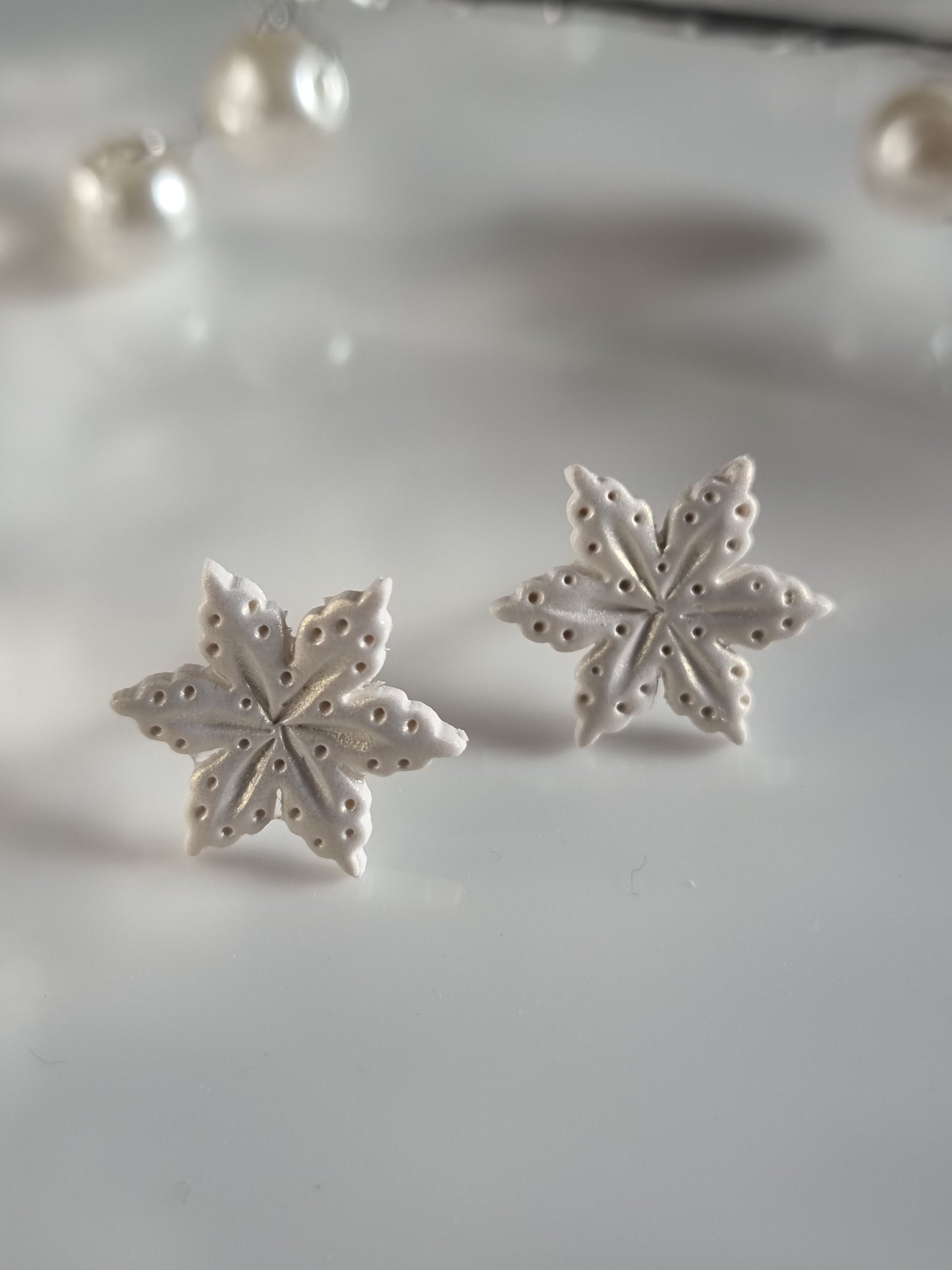 Snowflake studs