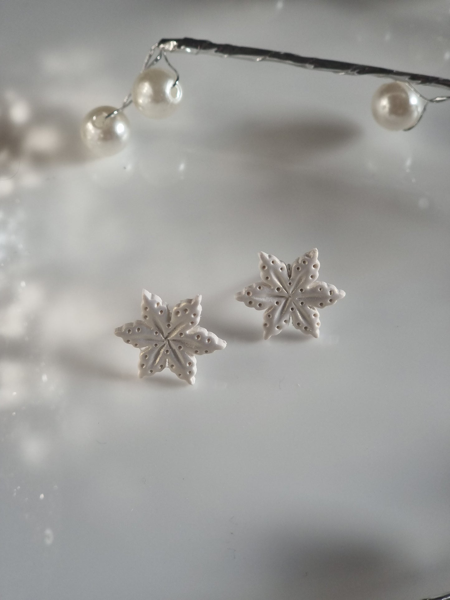 Snowflake studs