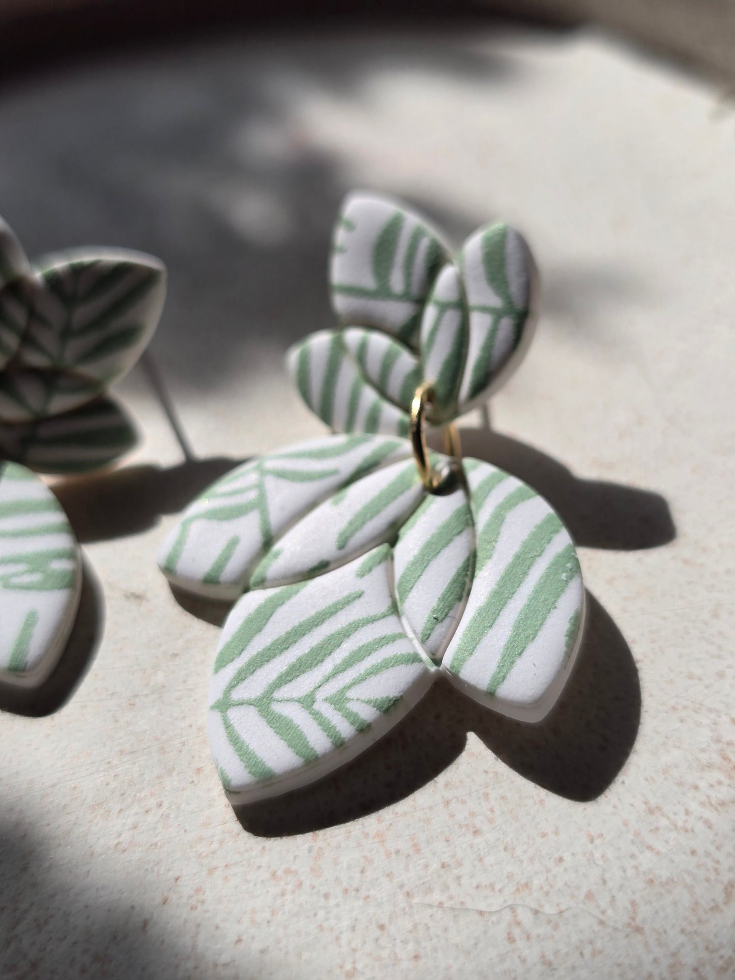 Palm print dangles
