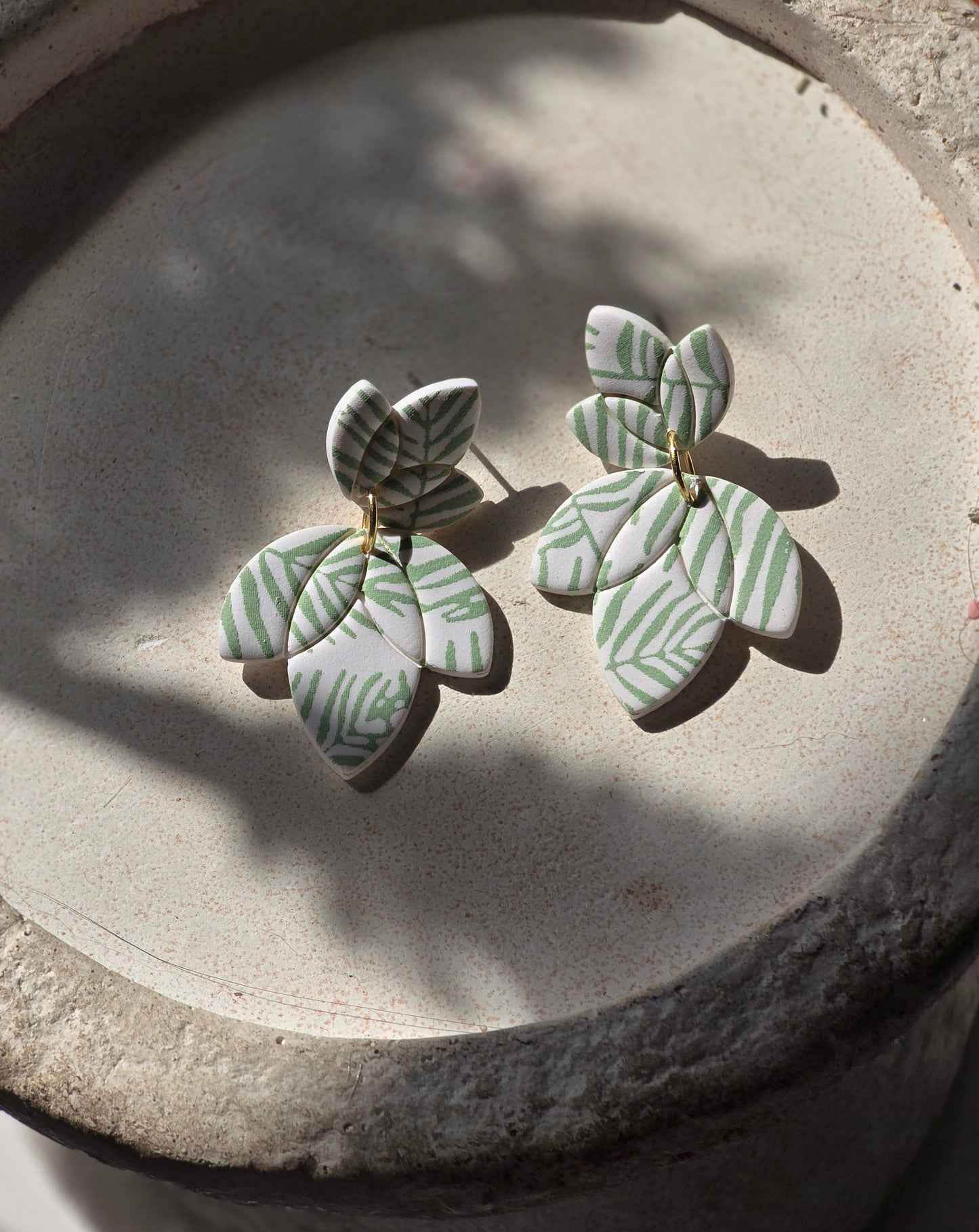 Palm print dangles