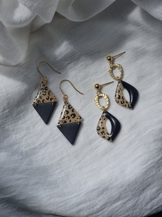 Leapord print dangles with charm