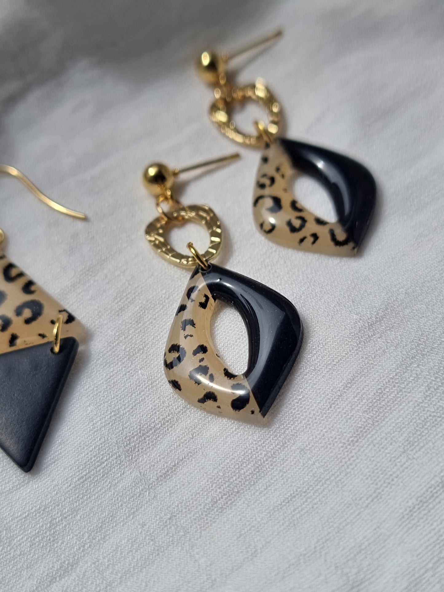 Leapord print dangles with charm