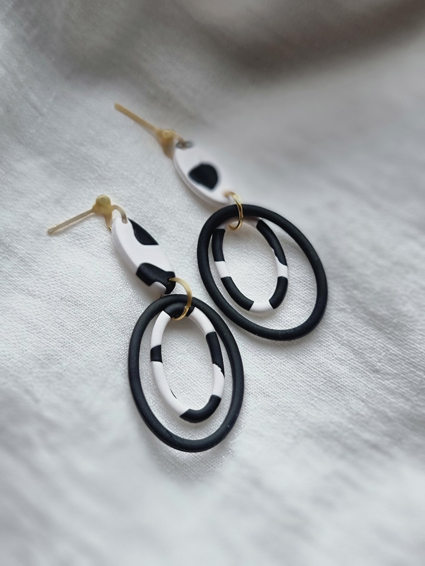 Cow print hoop dangles| can be switched for silver, fish hook