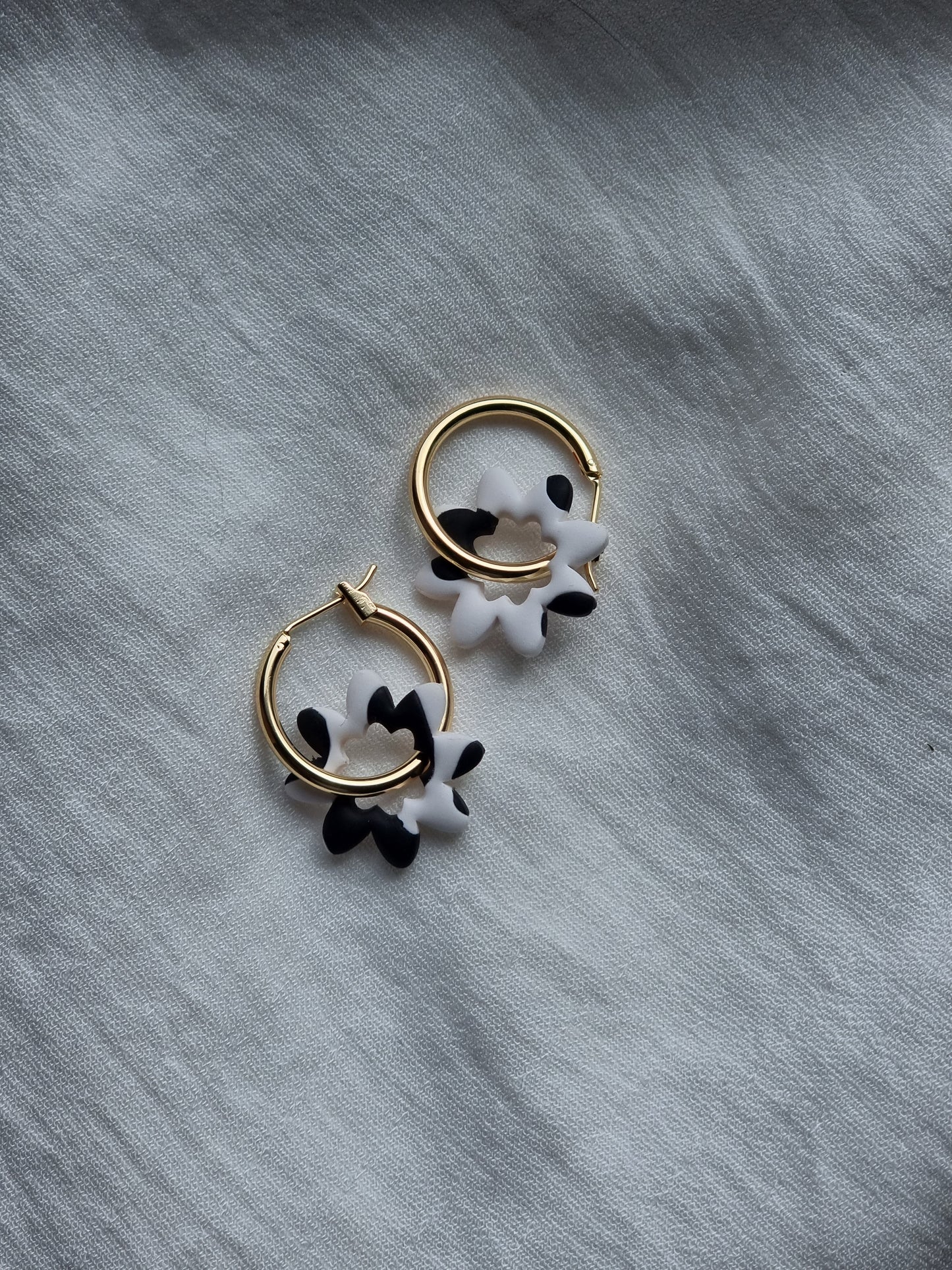 Cow print flower hoops