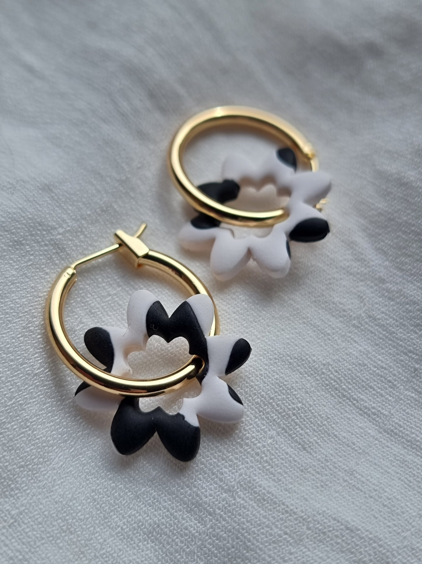 Cow print flower hoops