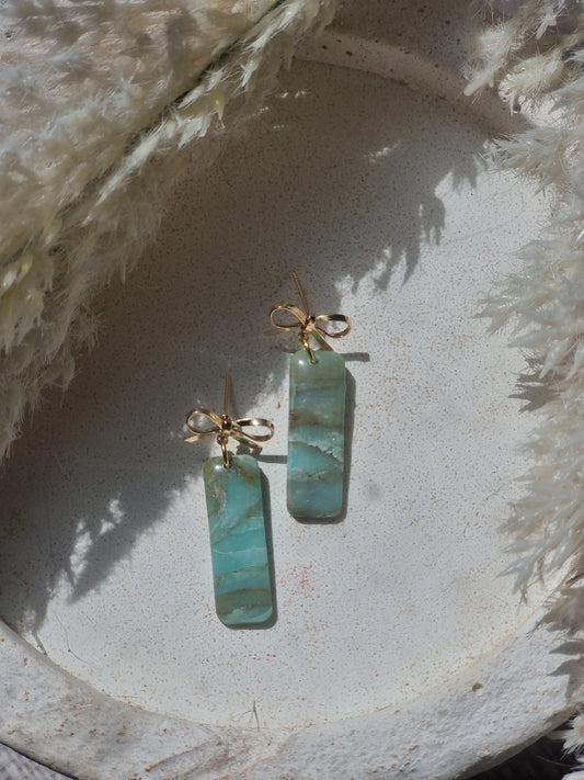 Turquoise rectangle bow top dangles