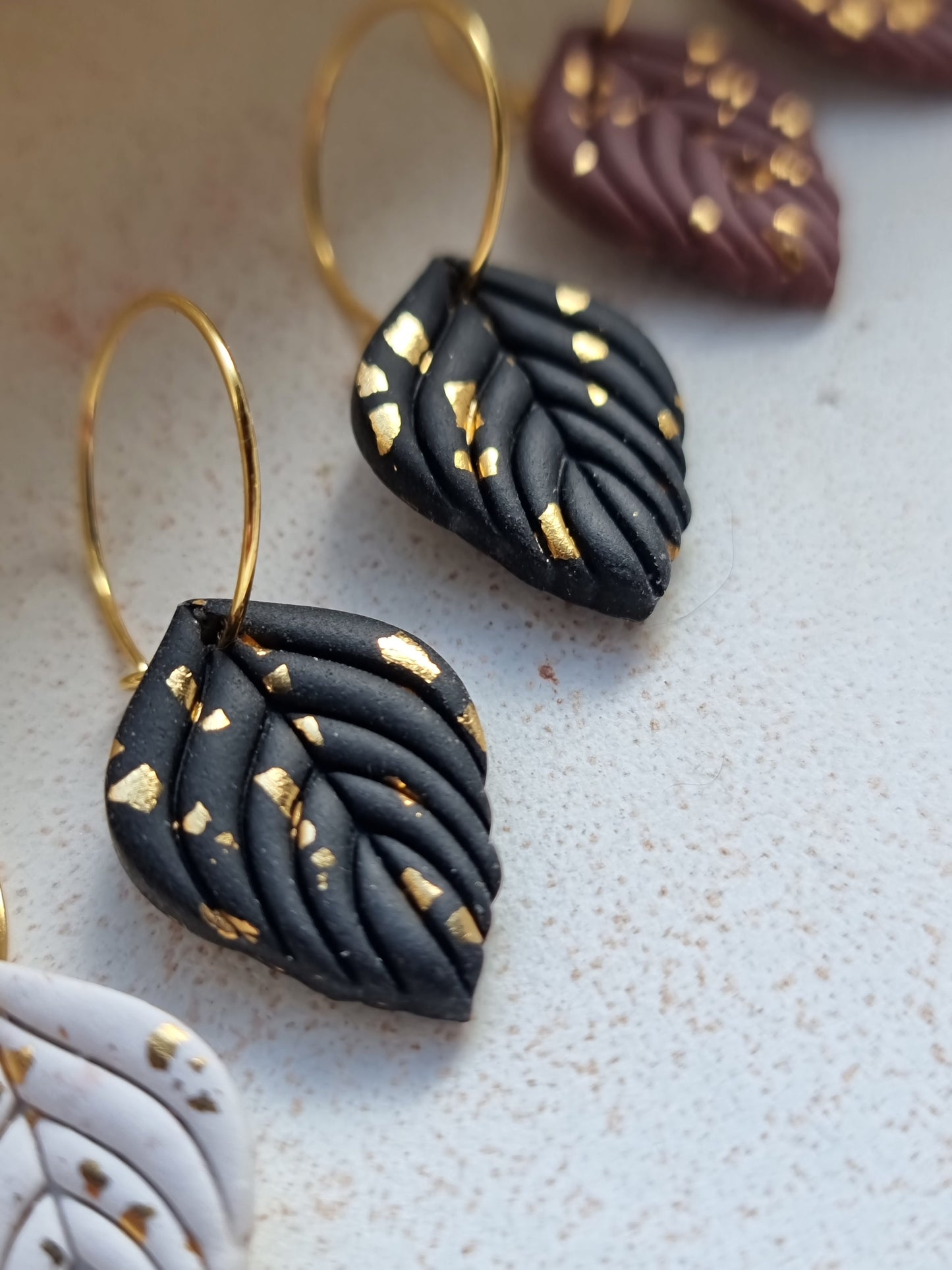 Leaf hoops in gold