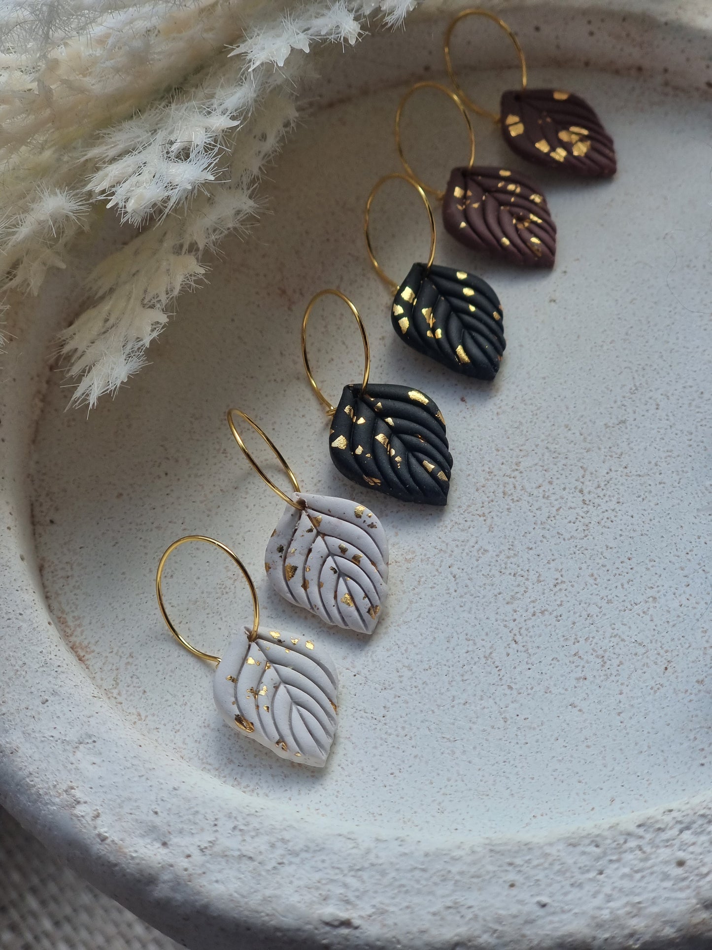 Leaf hoops in gold