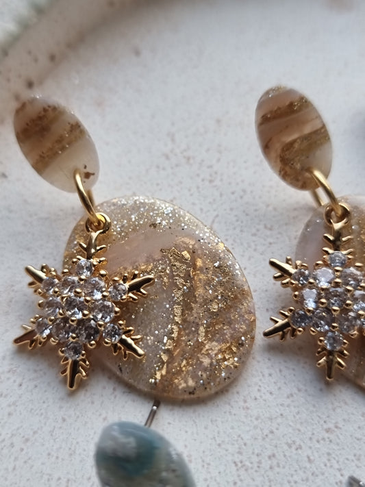 Snowflake dangles white and gold