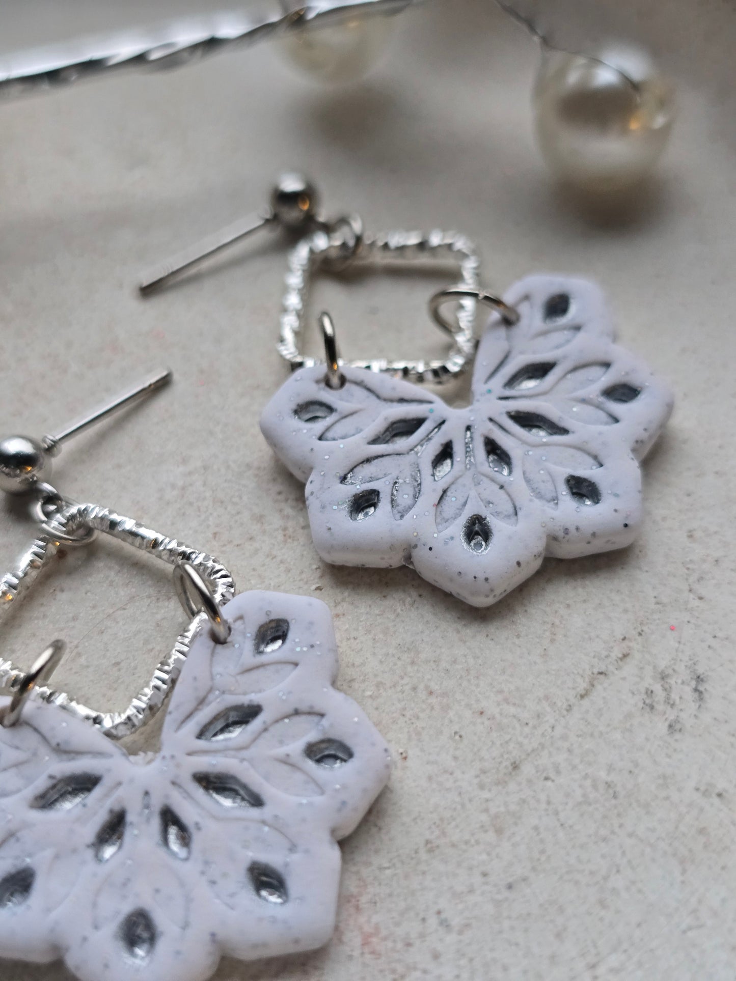 Snowflake charm dangles