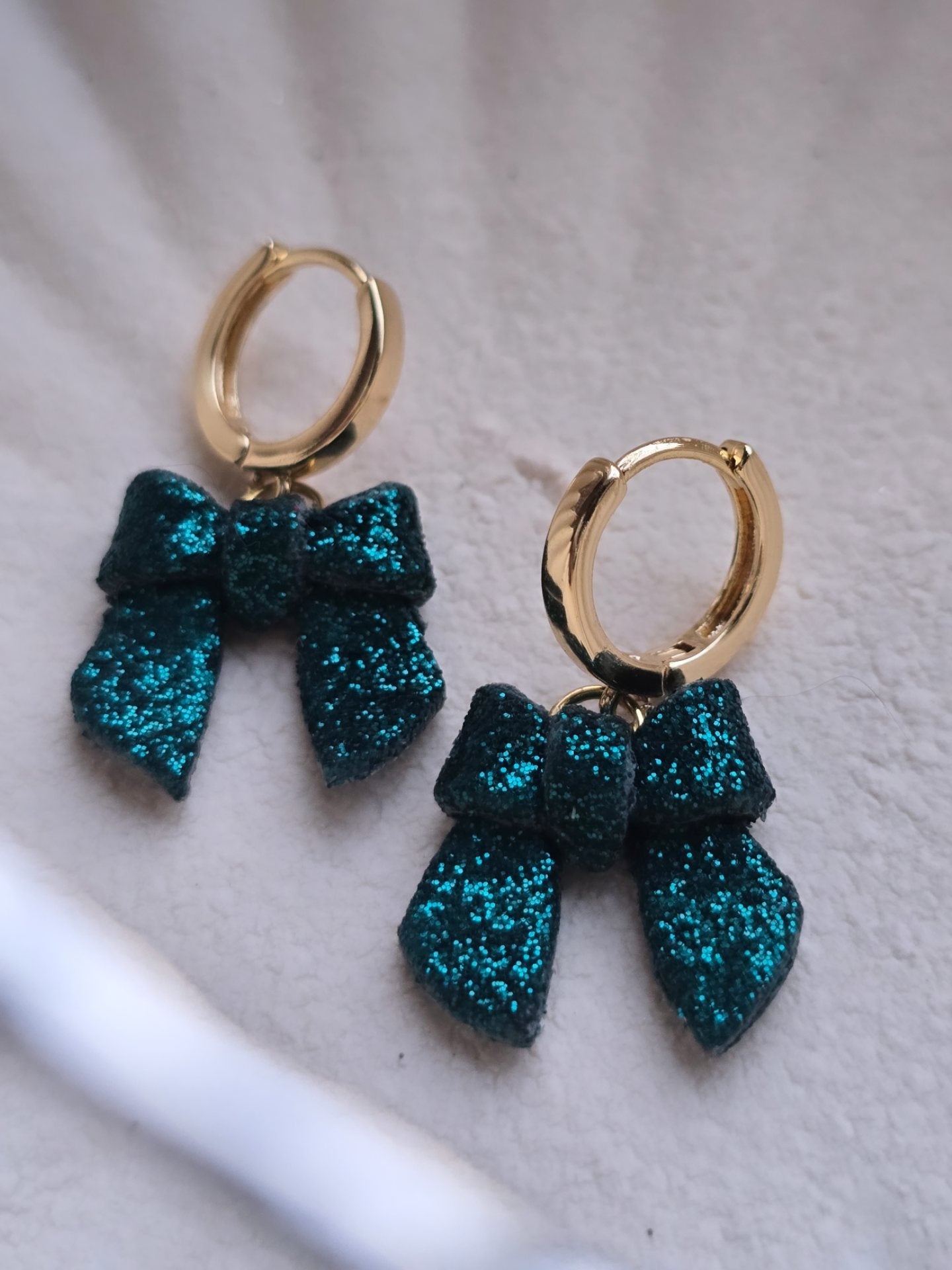 Glitter bow huggies| green