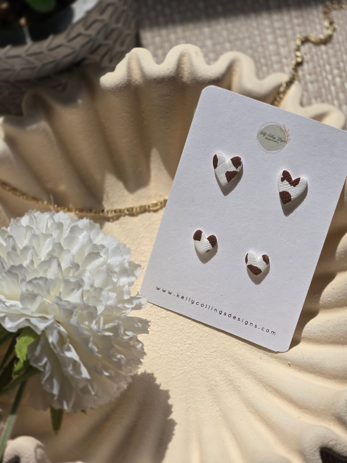 Duo heart studs