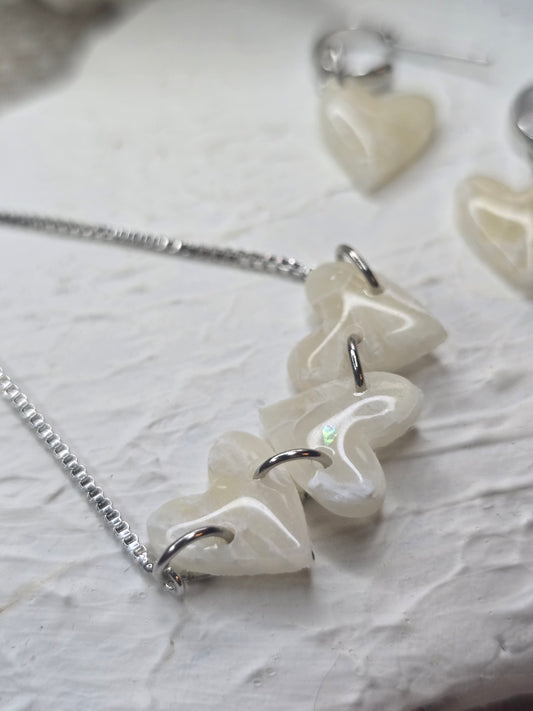 Heart bracelet and earrings set in silver