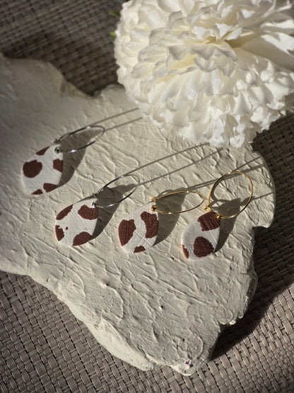 Cow print denim hoops