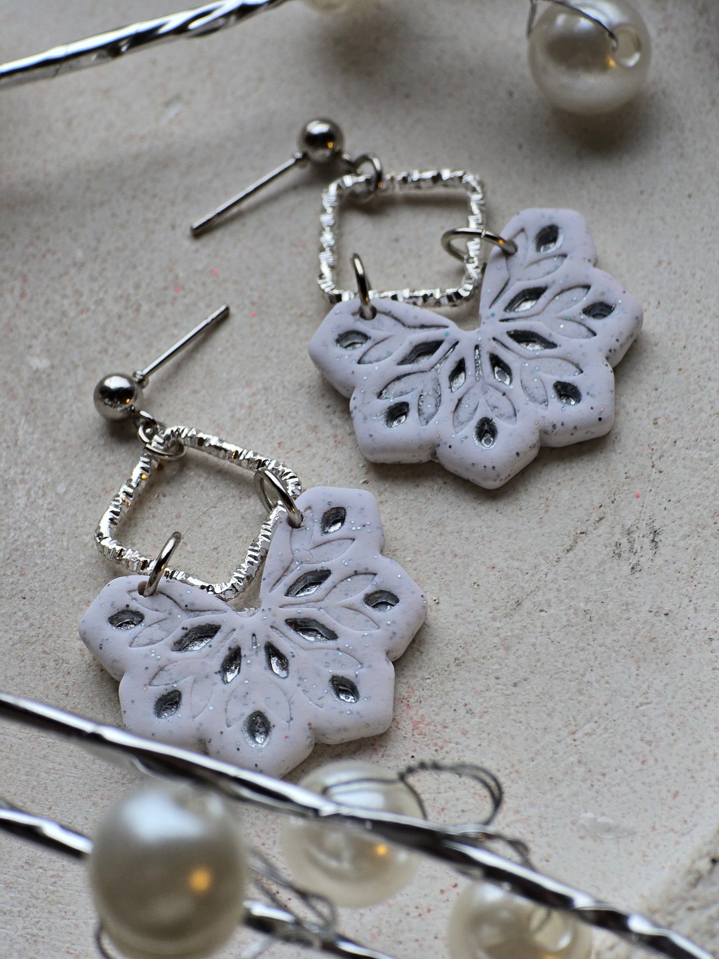 Snowflake charm dangles