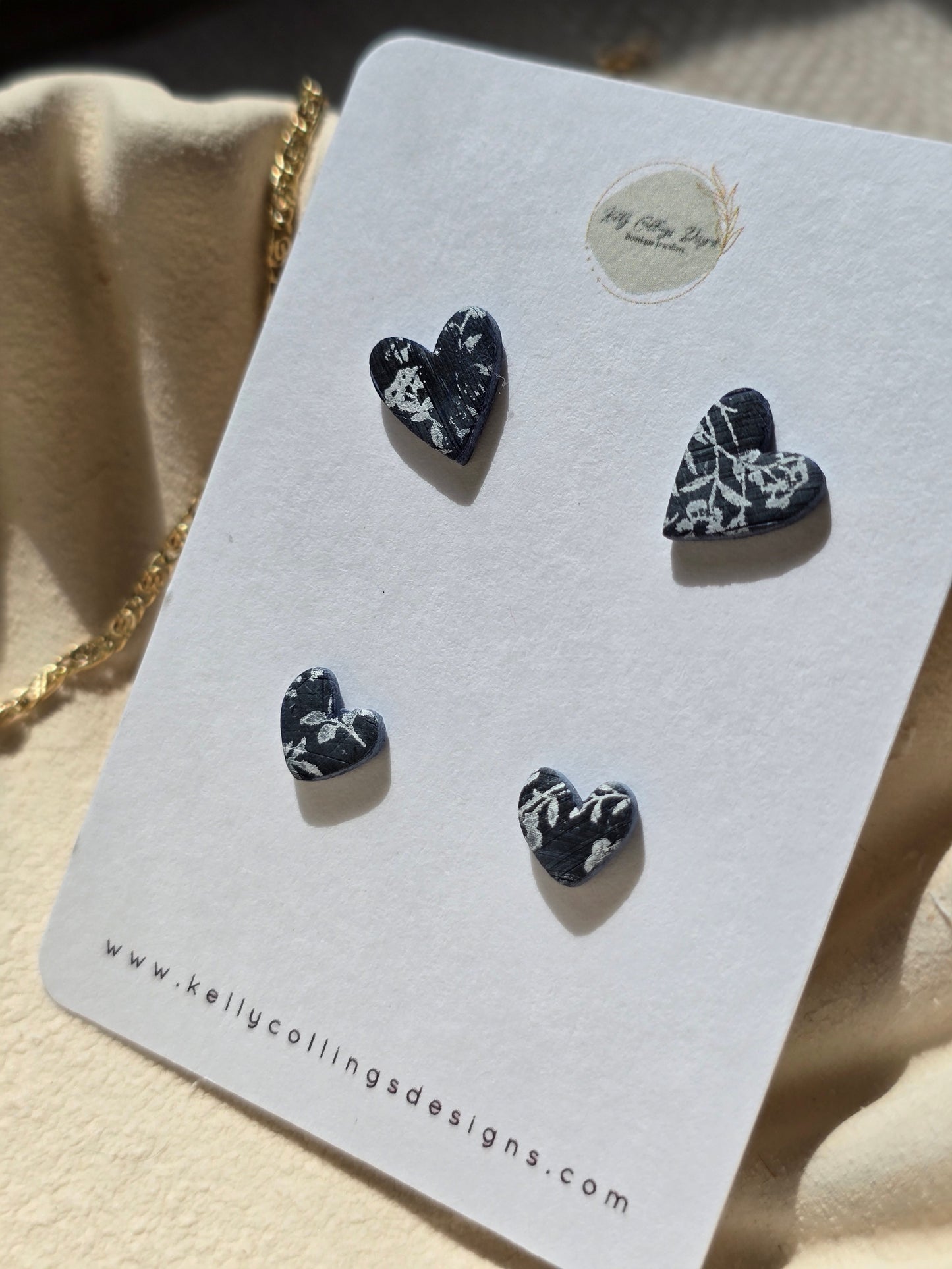 Duo heart studs