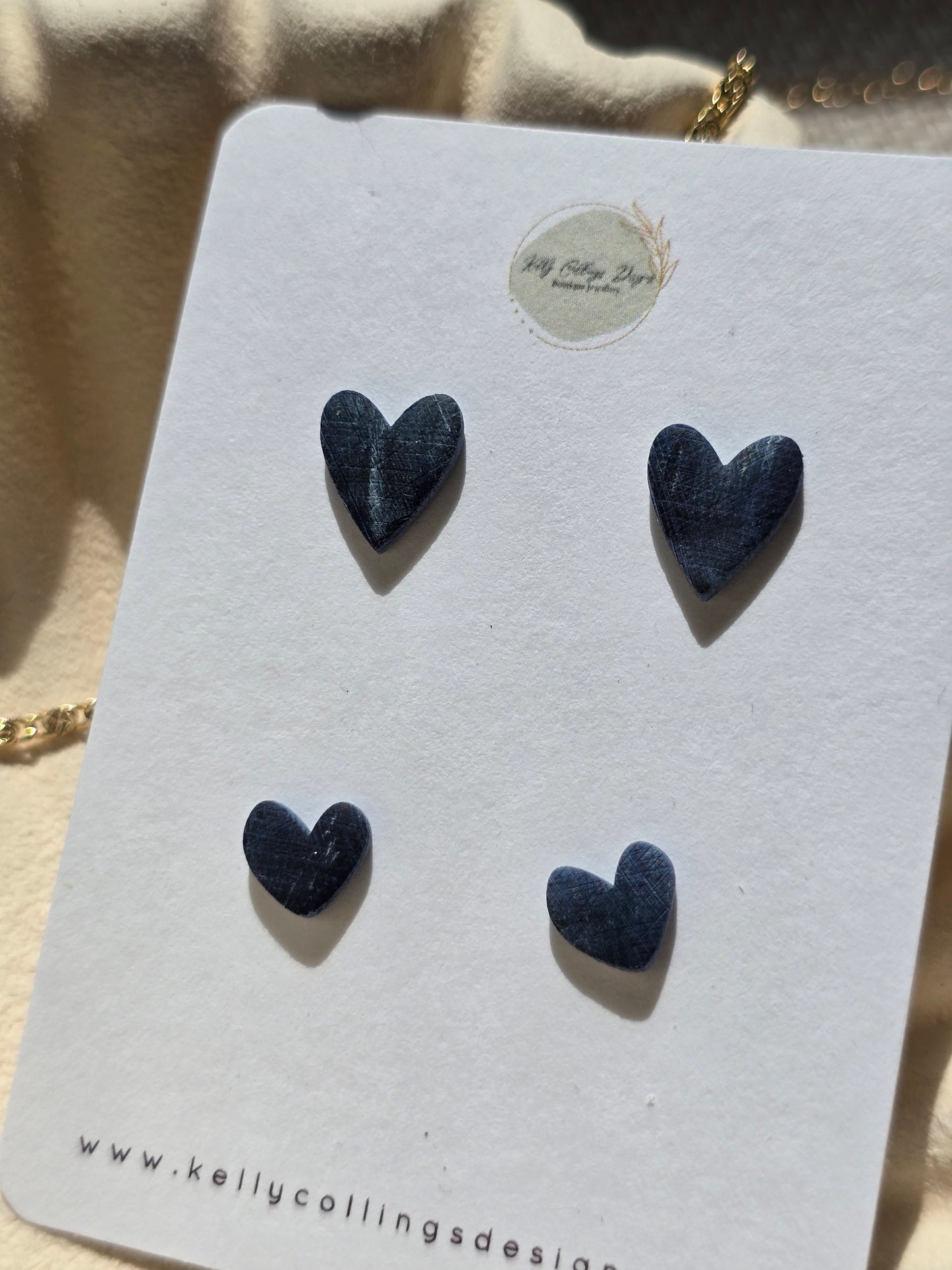 Duo heart studs