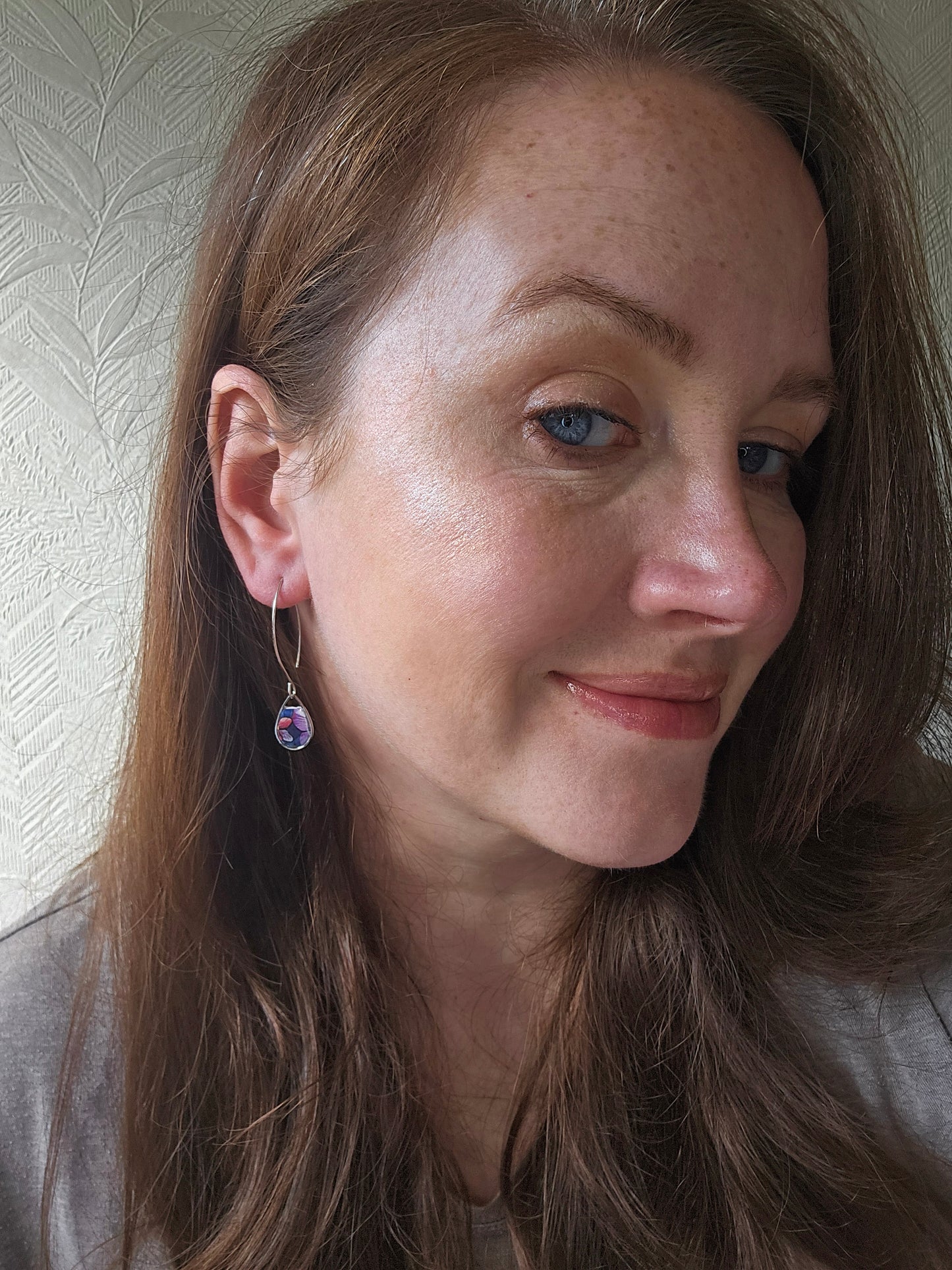 Floral drop earrings in silver