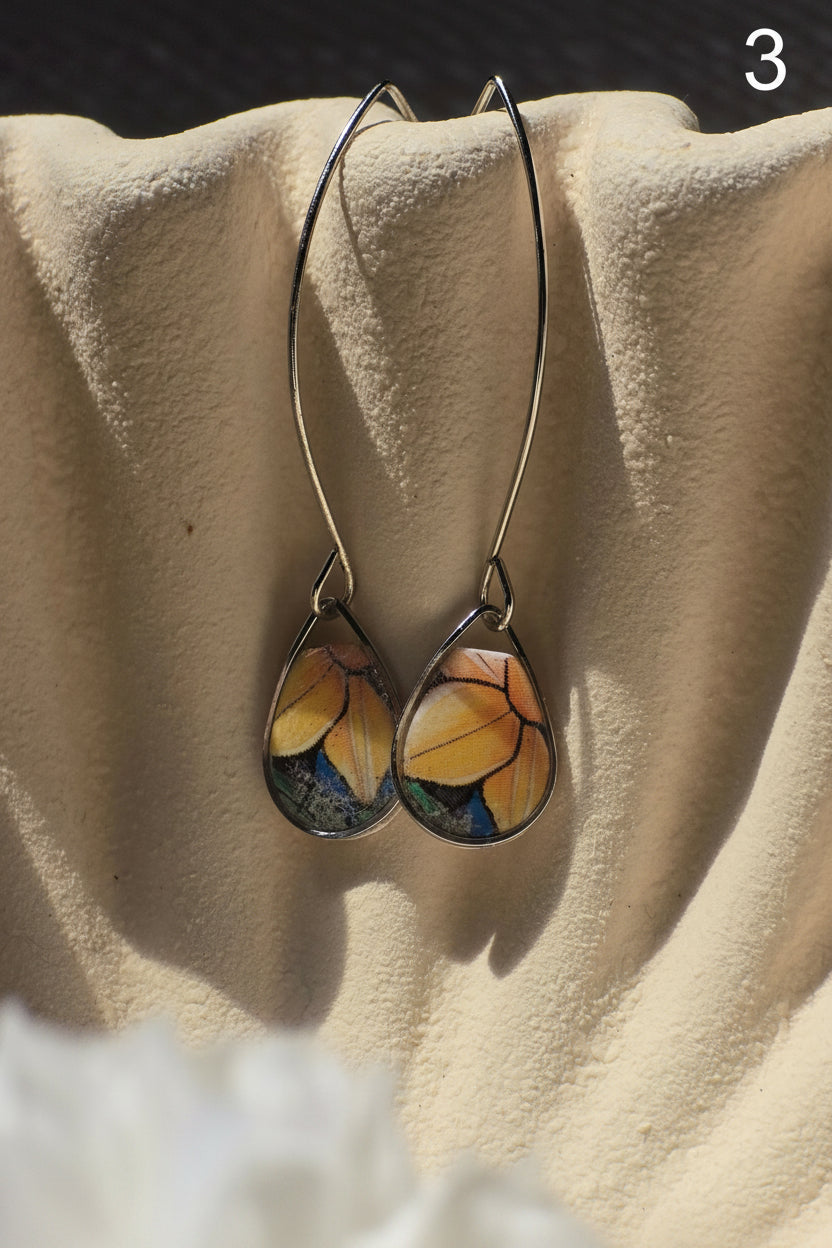 Floral drop earrings in silver