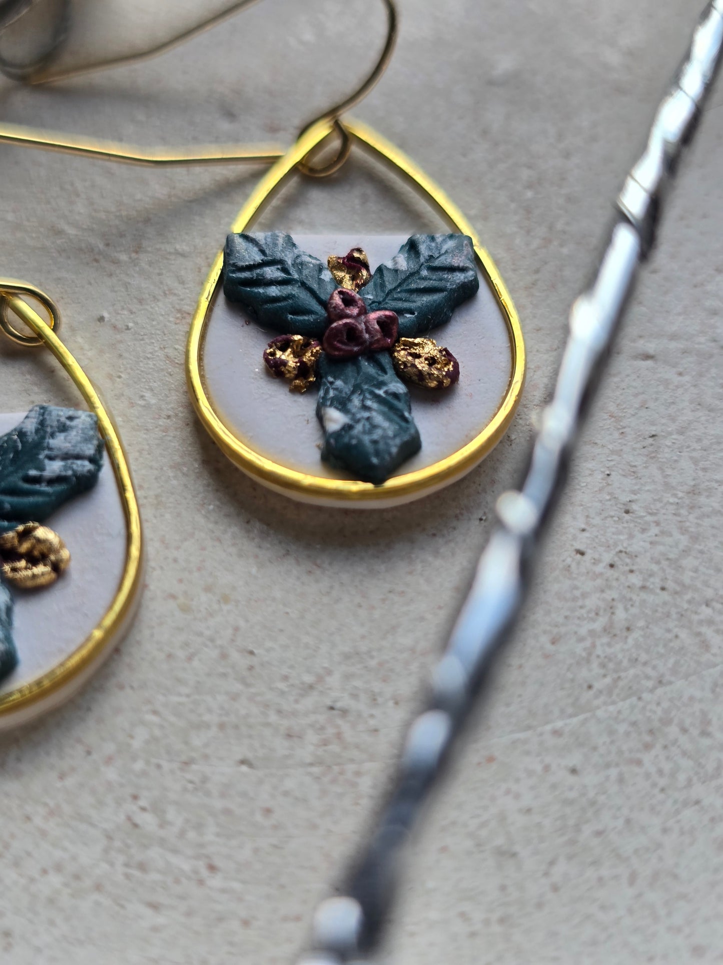 Gold trim holly dangles